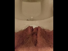 Close up Hairy Ginger Pussy pissing on toilet