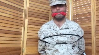 Marine Tied to Chair