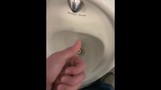 Wanking in City centre public toilets had a big cumshot 