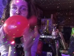 Hairy Hippie Looner Girl With Dreadlocks Inflates Red Balloon