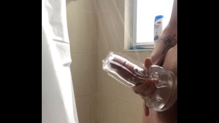 In The Shower A Teenager Employs A See-Through Fleshlight