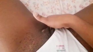 Baby black girl playing with her pussy 
