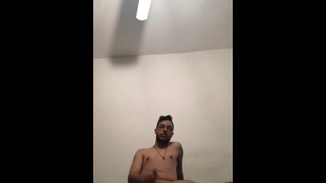 Masturbating