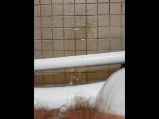 Petite pees in bathroom gets feet wet