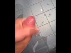 Cumming on blue tile floor
