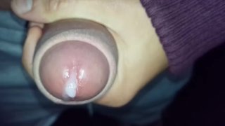 Slow motion - Thick cum leaking out of uncut cock