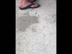 Spring training baseball game outside bar, female feet next to me!