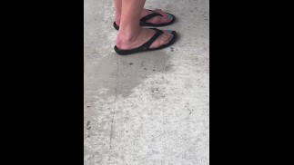 Spring training baseball game outside bar, female feet next to me!