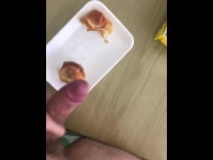 Adding the sauce to her breakfast 