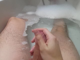 Stroking my hard cock in the bath and spurting cum