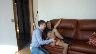 A Man Wearing A Chastity Belt Receives A Spanking And Licking Instruction From A Russian Mistress