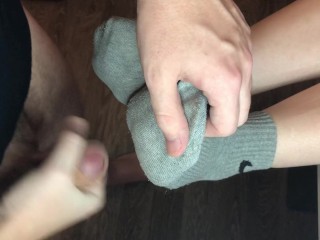 teen sockjob with gray nike socks, footjob teen socks after gym fuck cum