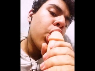 cute boy practicing blowjob on dildo 