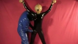 Latex Catsuit Girl With Rubber Ballhood In Bondage Gasmask Breathplay