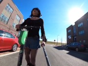 Short skirt on a scooter 