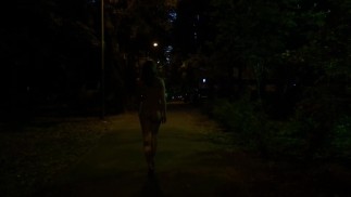 Mystery naked woman on the street at night