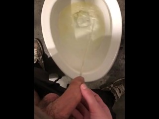 Pissing in Public Directioning Piss with his Cock