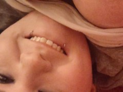 Chubby girl licks huge tits makes eye contact