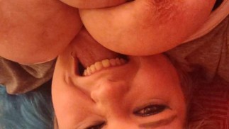 Chubby girl licks huge tits makes eye contact