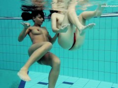 Nina Markova and Zlata Oduvanchik swimming naked in the pool
