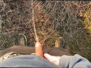 Horny guy takes a piss and handsfree cumshot
