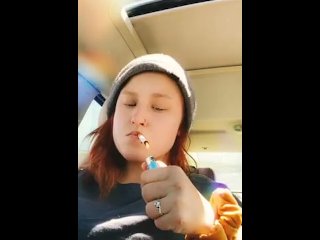 solo female, smoking, vertical video, red head