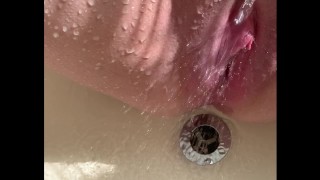 Tight Wet Pussy girl Squirts in the Bathtub