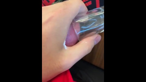 Filling a shotglass full of cum