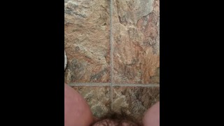 Piss on bathroom floor