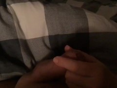 Casual handjob while wife watches tv on smartphone