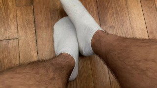 French students play with his feets and white socks