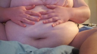 teen plays with stuffed belly 