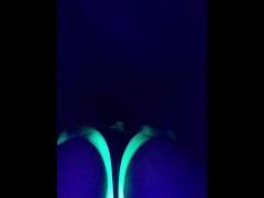 Glowing ebony ass under blacklight