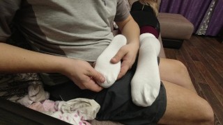 Sexy girl shows her feet in pantyhose and golf knee socks soles foot fetish