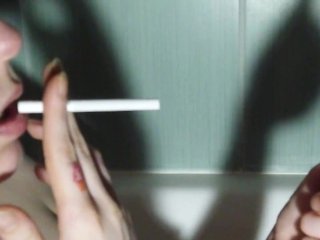SMOKING GIRL IN SLOW MOTION. LIPS
