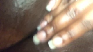 Ebony shows off tight ass and pussy