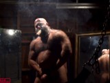 HYPER MASCULINE MUSCLE HAIRY BULL SMOKING HIS CIGAR IN FRONT OF THE SLING