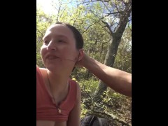 Skinny young slut puts cock in her throat in the forest