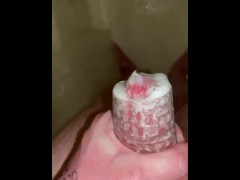 Blowing a massive load with a stroker in the shower