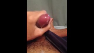 Masturbating