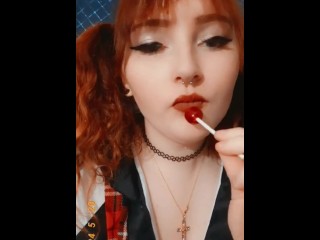 Redhead Tease with a Sucker