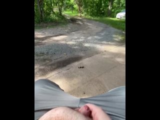 Fat guy jerks off outside and cums.