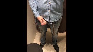 Jerking off in the fitting room of the shopping center