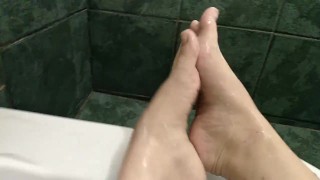 I want my soapy feet around your cock