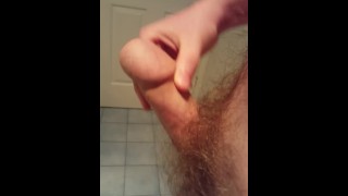 Thick cock wanked in bathroom, cums in bath