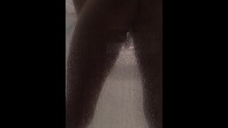 Uncut Latino playing with ass and cock in shower