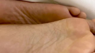Black Feet Between the Sheets While Getting Fucked