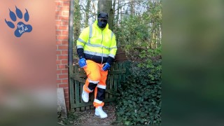 quick pawing off in hi-vis tracksuit and sneakers outdoors