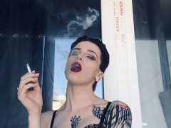 hot girl in red lipstick smoke on the balcony only in bra