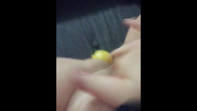 Stuffing my pussy with a lemon